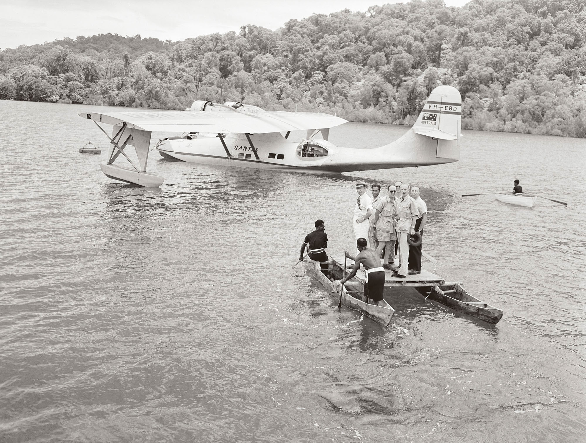 Members of the UN arrive on Tonelei Harbour at the southern end of Bougainville Island. Photographer: W. Brindle. Collection of the National Archives of Australia.