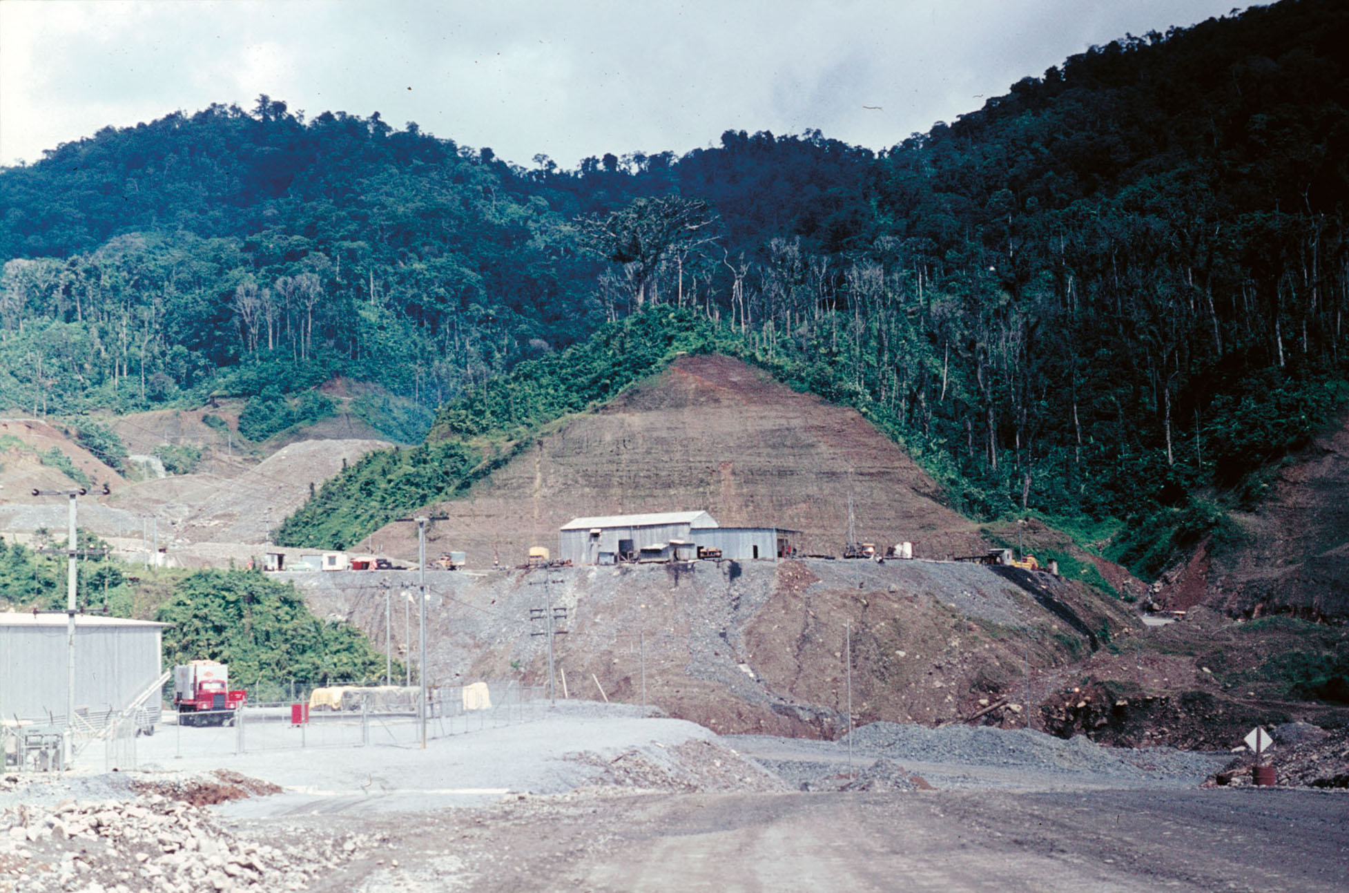 Cutting away the hills spurs, Bougainville Island, Papua New Guinea, March 1971. Photographers: Terence E.T. Spencer and Margaret Spencer. Collection of the National Library of Australia.