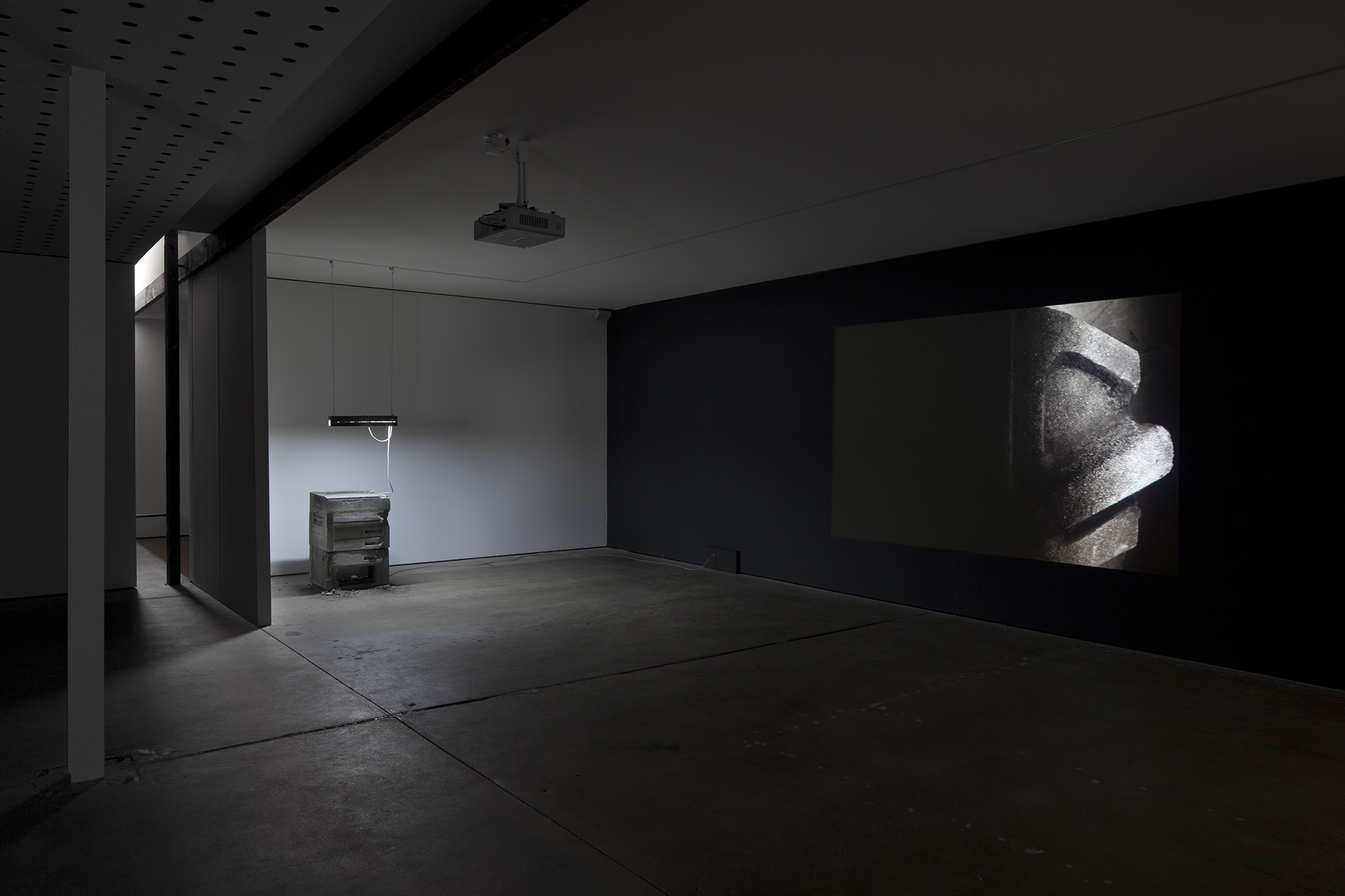 _Some Kinds of Duration_, 2011. Installation View, CCP - Centre for Contemporary Photography, Melbourne Australia, 2012. HD video colour, silent, concrete, fluorescent light, steel, carbon.