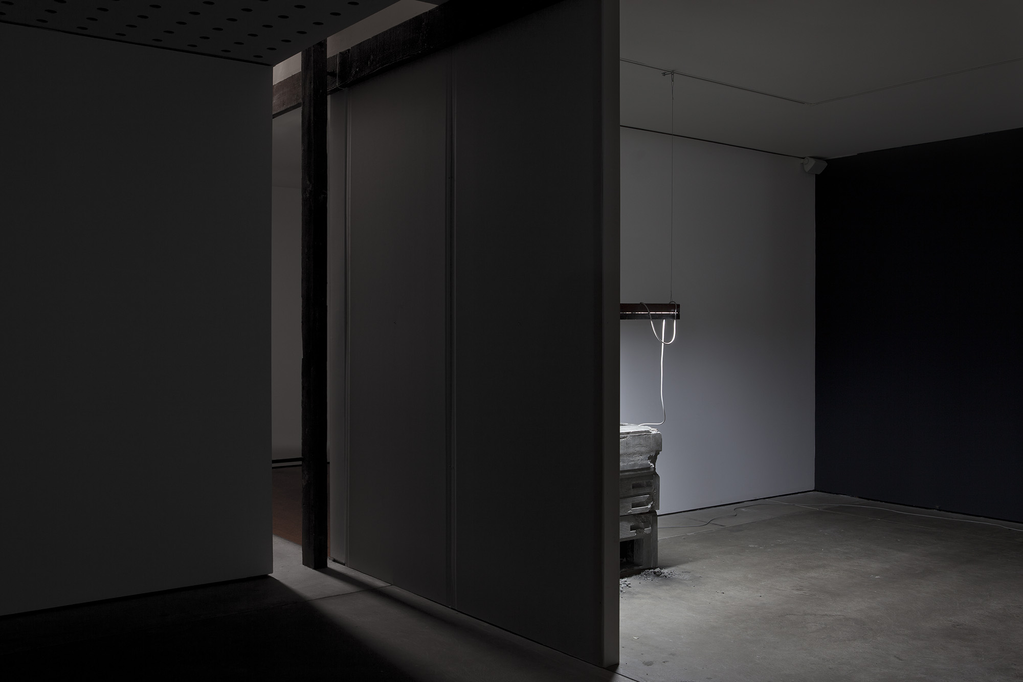 _Some Kinds of Duration_, 2011. Installation View, CCP - Centre for Contemporary Photography, Melbourne Australia, 2012. HD video colour, silent, concrete, fluorescent light, steel, carbon.